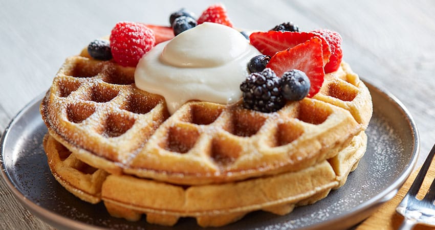 Goat Cheese Cream Sauce on a waffle with fruit
