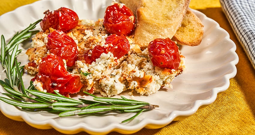 baked mozzarella goat cheese dip with candied tomatoes
